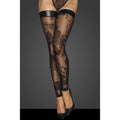 Black lace tights with floral patterns worn by a person on a gray background