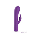 A purple silicone personal massager with a curved, finger-like stimulator arm, shown on a plain white background with a 'b swish' brand logo in the bottom right corner.