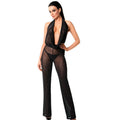 Woman wearing a black sheer jumpsuit on a white background