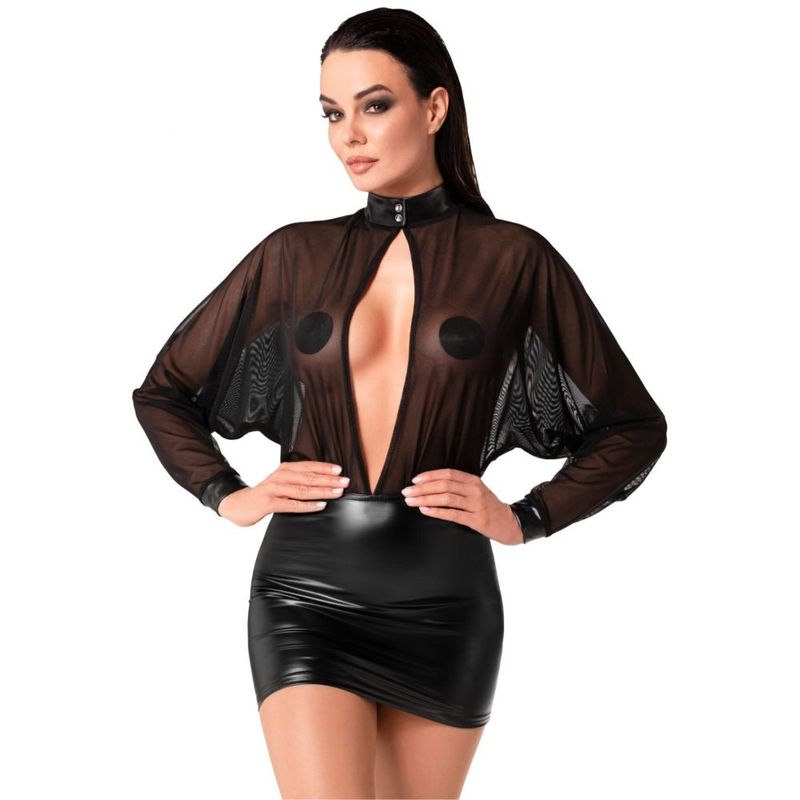 Woman wearing a black sheer top and black skirt on a white background