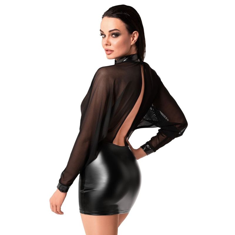 Woman wearing a black sheer top and leather skirt on a white background